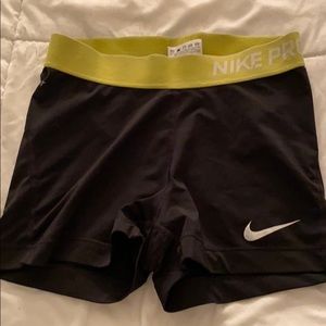 Nike pros with yellow band